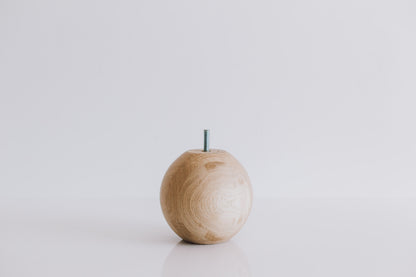 A single round turned wooden leg with a sphere shape, displayed against a white background.